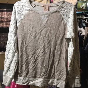 Tan sweater with white, flower lace sleeves